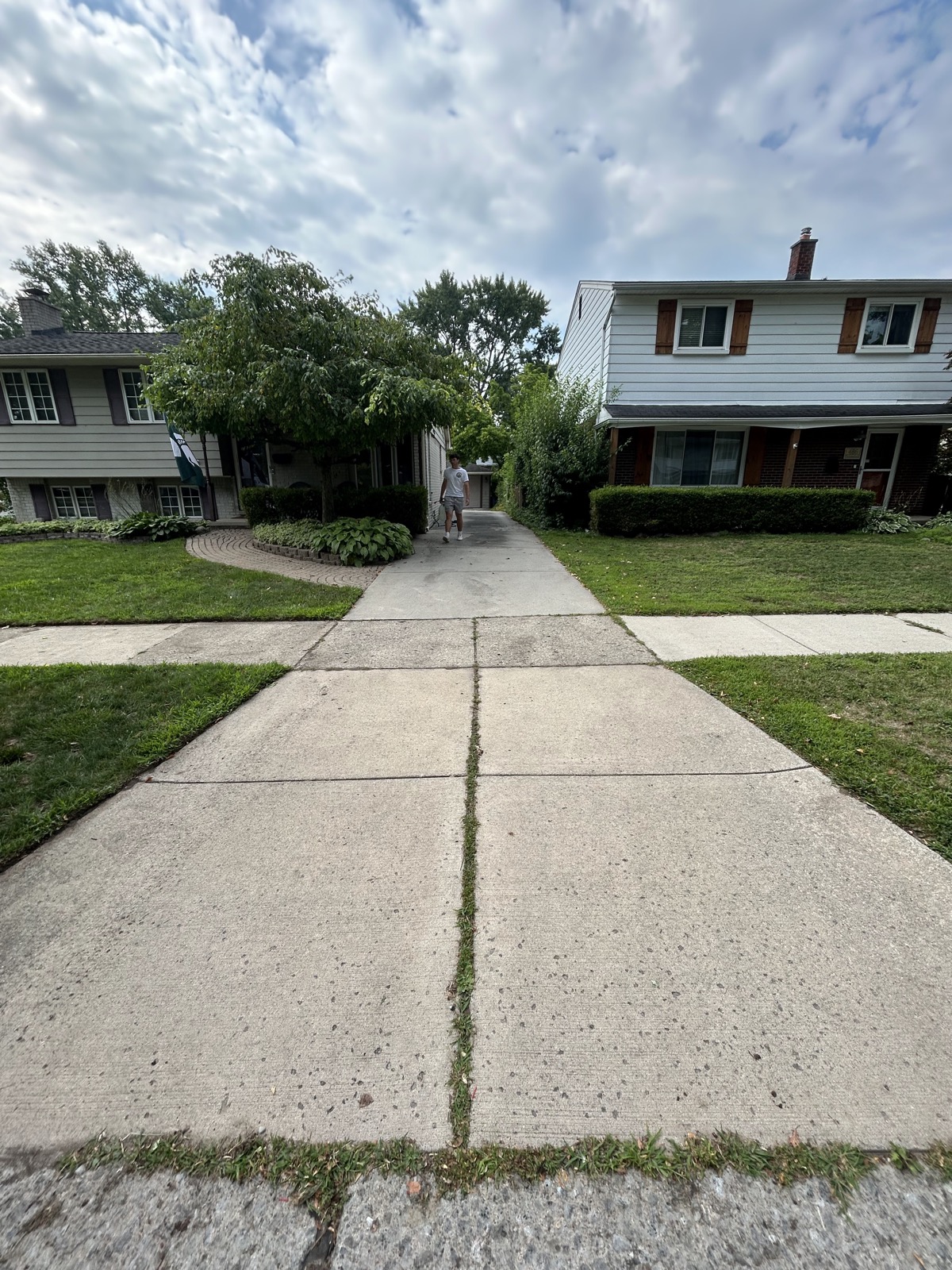 Clean sidewalk after pressure washing in Macomb County, Michigan